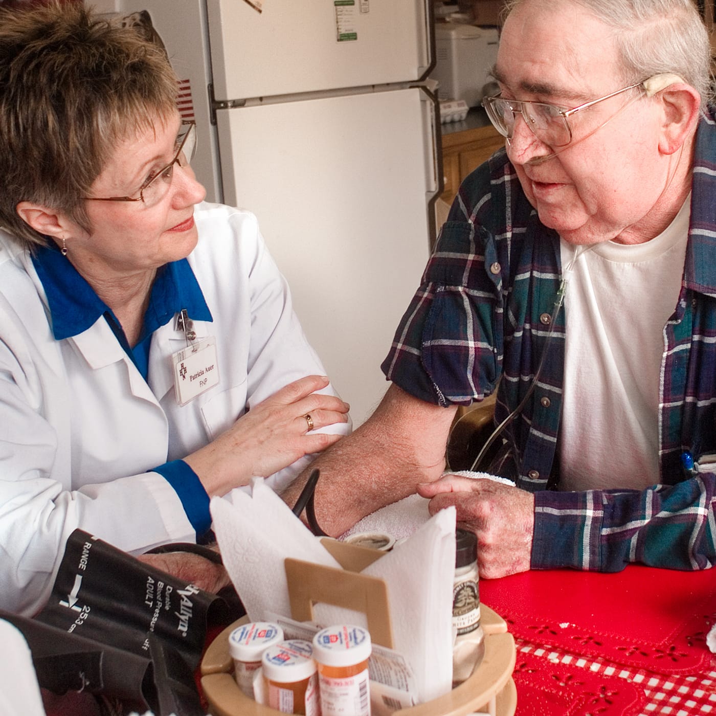 Doctor and patient seated together as part of the Homeward Bound Program.
