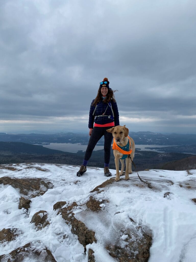 Alexandra Barbieri, MS, RD, CDN on a hike with her dog Willow