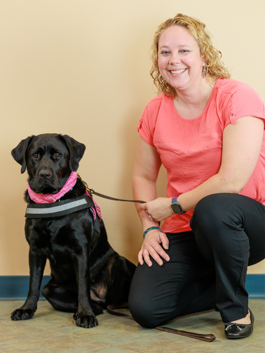 Susan Foster, FNP and service dog, Sage
