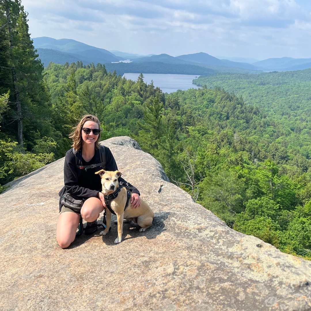 Jessica Hassan, M.D. hiking with her dog