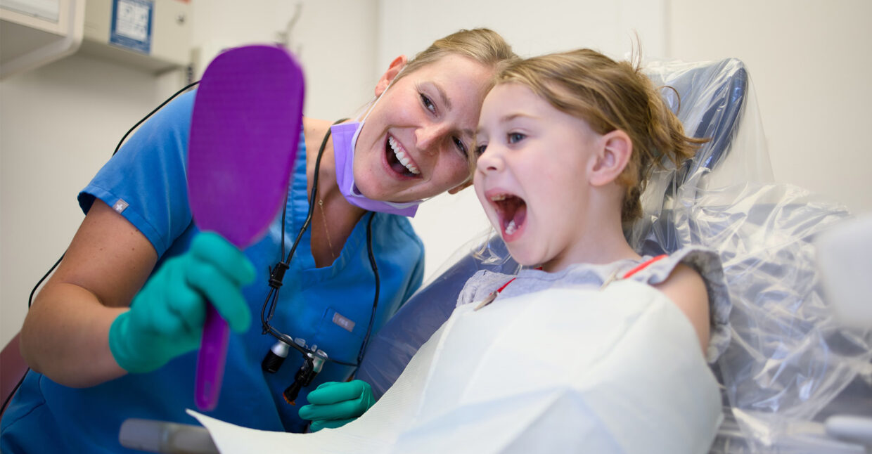 dentist and pediatric patient